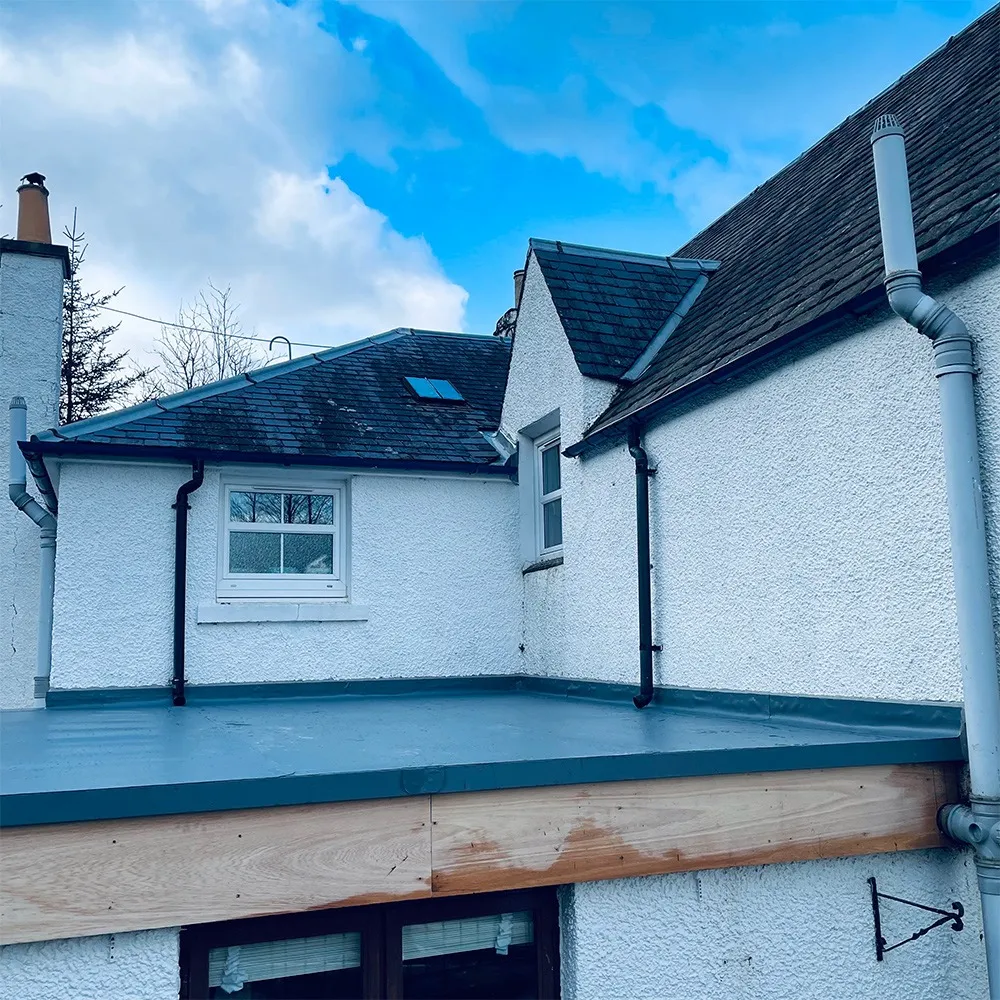 Flat roof extension on white cottage - Perth and Kinross